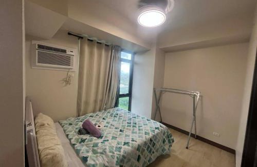 Tambo Apartment | Gentry Manor 2 Beds fast WIFI Near Okada MOA NAIA 8E