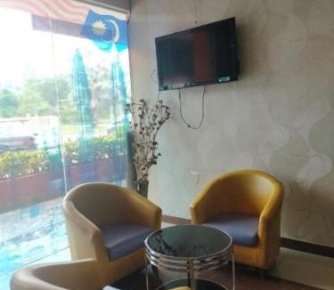 Gua Apartment | Get Inn Hotel at 1 Capital Holdings