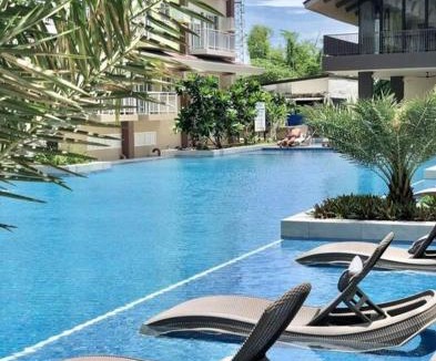 Mactan Export Processing Zone Apartment | Amani Grand Resort and Residences - Pool View Room 333B Free wifi, netflix, pool and gym house, 3mins to Mactan Cebu International Airport
