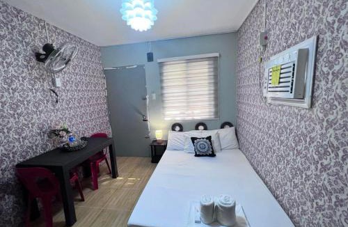 Cabanatuan Apartment | DJCI Apartelle Walk to Robinson & NE Pacific Mall 3 Min to SM Cabanatuan