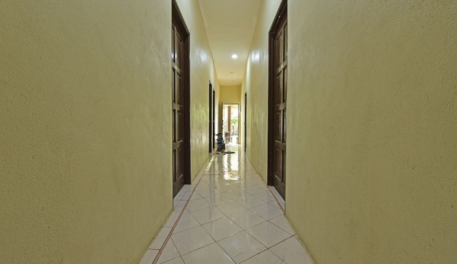 Oyo 90596 Casaria Inn
