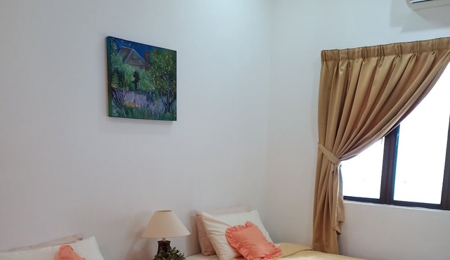 A family friendly, cozy, serene & spacious bungalow house close to beach in Tanjung Bungah