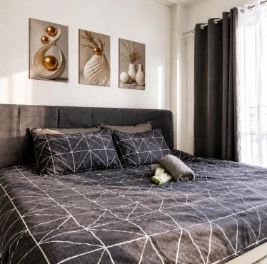 Sunlit City-View Suite by Alicia & Elmer in Dagupan