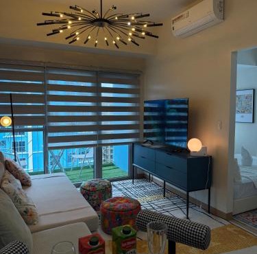 HomeMadeLuxury 1BR Seaview Poolview Near Okada Airport