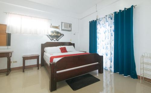RedDoorz Premium at Casa LenidaRose