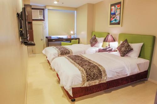 The Exchange Regency Residence Hotel Managed by HII in Manila